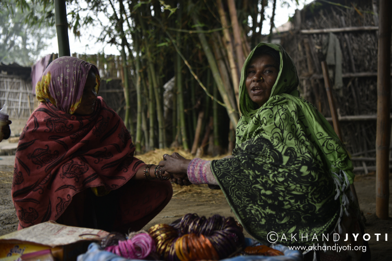 Woman selling bangles in village